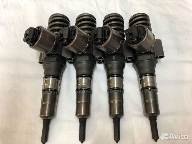 Форсунка 03G130073G VolksWagen Passat Touran 2.0