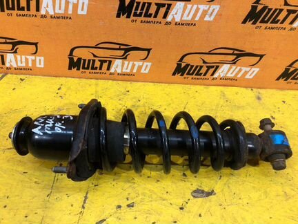 Амортизатор задний левый Toyota Avensis 2 T250