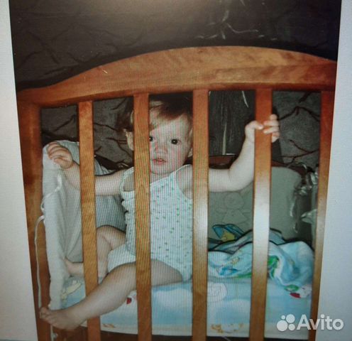 Кроватка детская с маятником