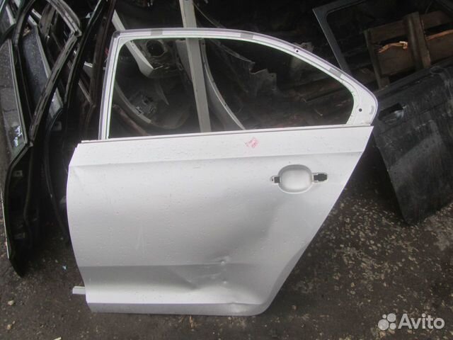 Дверь задняя левая правая Skoda Rapid