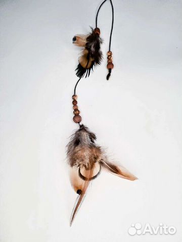 Перья на заколке