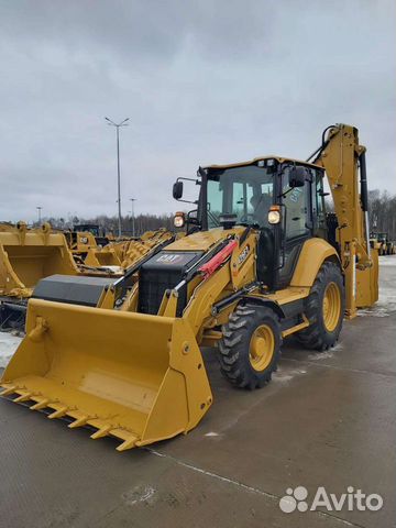Экскаватор погрузчик CAT