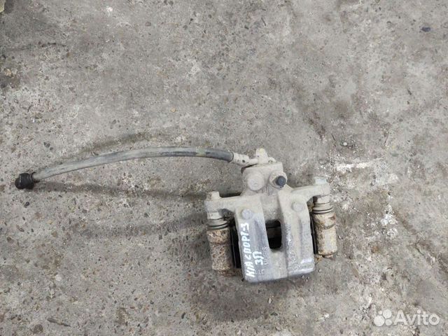 Kia Sportage 3 суппорт задний правый