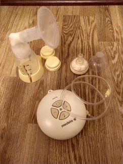 Молокоотсос Medela Swing