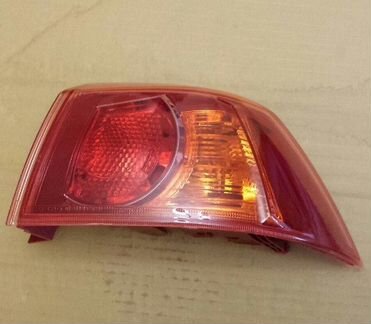 Фонарь задний Митсубиси Лансер 10
